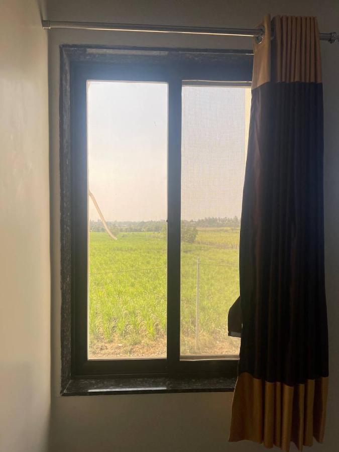 Hotel Nilkanth Navsari Extérieur photo